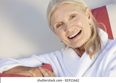 Happy Senior Woman In Spa Robe