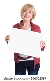 Happy senior woman standing with white blank board isolated on white background
