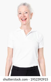 Happy Senior Woman In White Polo Shirt With Design Space Studio Portrait Close Up