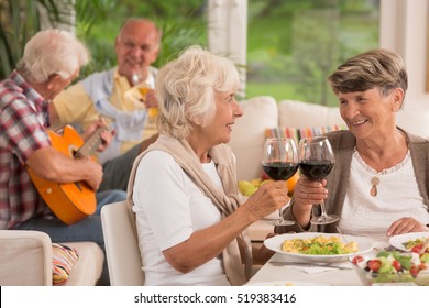 Happy Senior Women Drinking Red Wine  For Husbands!