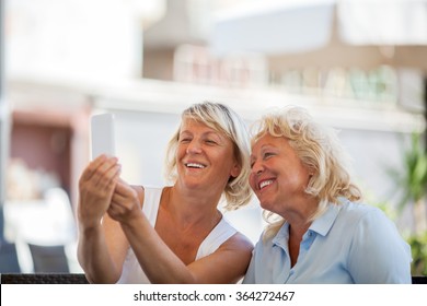Happy Senior Women Making Mobile Selfie