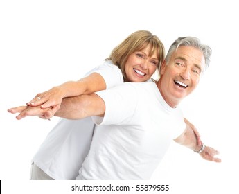 Happy Seniors Couple In Love. Healthy Teeth. Isolated Over White Background