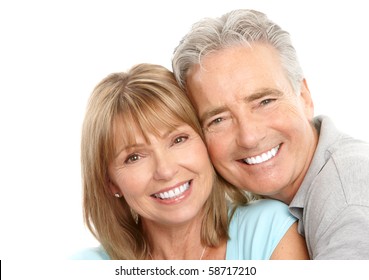 Happy Seniors Couple In Love. Healthy Teeth. Isolated Over White Background