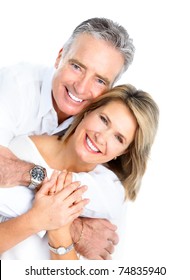 Happy Seniors Couple In Love. Healthy Teeth. Isolated Over White Background