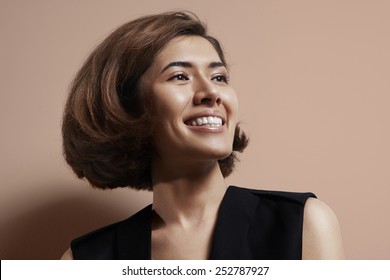 Happy Shiny Asian Woman With A Short Hair