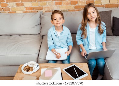 Happy Siblings Online Studying Near Gadgets At Home