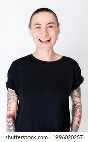 Happy Skinhead Model With Tattoos In Black T Shirt