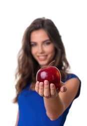 Happy Slender Smiling Woman Holding Red Apple Isolated On A White Background. Looking At Camera. Studio Portrait. Healthy Food, BIO Viands, Back To Nature Concept.