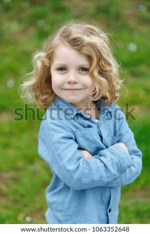 Similar – Small child with long blond hair enjoying of a sunny day