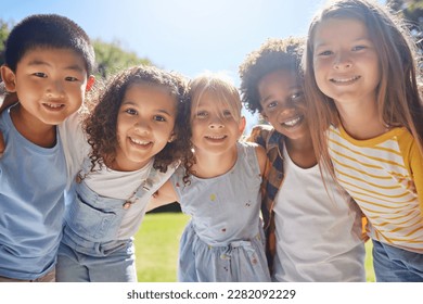 Happy, smile and portrait of kids in a park playing together outdoor in nature with friendship. Happiness, diversity and children friends standing, embracing and bonding in a outside green garden. - Shutterstock ID 2282092229