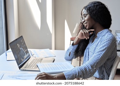 Happy Smiling African Black Business Woman Manager Or Student Having Virtual Meeting With Indian Man Teacher Or Partner Online Calling E Learning, Remote Working At Home Office. Video Conference Call.