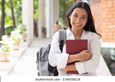 happy smiling asian woman college student - Powered by Shutterstock