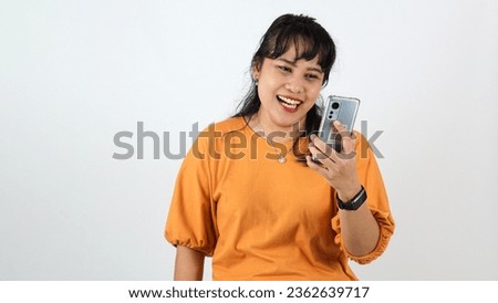 Happy smiling asian woman mother talking on video call through smart phone or online calling to children or kids or family in white background