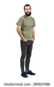 Happy Smiling Bearded Hipster With Hands In Pockets. Full Body Length Portrait Isolated Over White Studio Background.