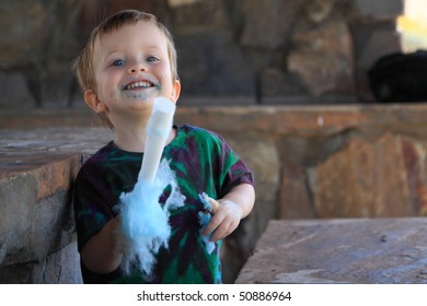 Happy Smiling Boy With Cotton Candy