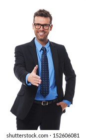 Happy Smiling Businessman Giving Hand For An Handshake