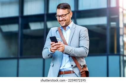 Happy smiling businessman making video call with his client on smartphone. Business, lifestyle concept - Powered by Shutterstock