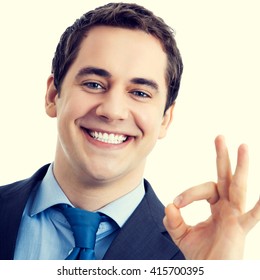 Happy smiling cheerful senior businessman with okay gesture. Success in business concept. - Shutterstock ID 415700395