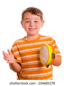 Happy Smiling Child Playing Tambourine Isolated On White