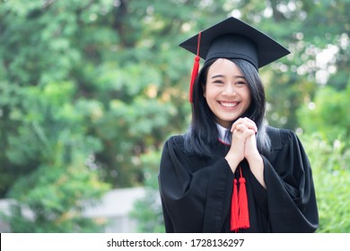 happy smiling college student graduating; concept of successful education, happy commencement day, woman education equality, employment opportunity, high education degree, overseas study scholarships - Shutterstock ID 1728136297