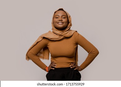 Happy Smiling And Laughing Muslim Woman Teenager African Ethnicity In Traditional Hijab Over White Studio Background. People And Religion. Nations Of The World