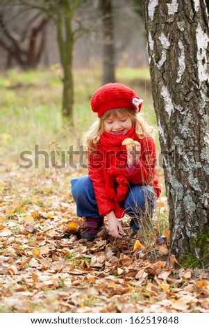 Similar – Image, Stock Photo happy funny kid girl eating fresh apple in autumn