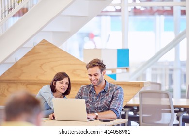 Happy Smiling Man Busy Working With His Female Partner