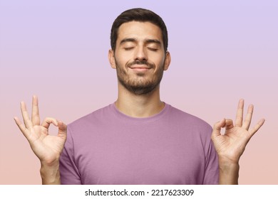 Happy smiling man standing with closed eyes, having relaxation while meditating, trying to find balance and harmony isolated. Yoga and meditation. - Powered by Shutterstock