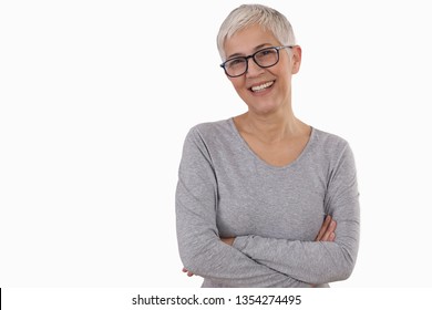 Happy Smiling Mature Woman Wearing Glasses On White Background.