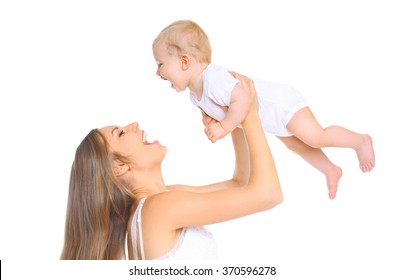 Happy Smiling Mother And Baby Playing On A White Background