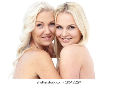 Happy smiling mother and daughter isolated on white background