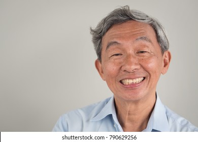 Happy Smiling Positive Old Senior Retired Old Man Face Portrait; Happy Positive Good Lifestyle Of Senior Old Man; Gray Hair Handsome Aged Asian Chinese Senior Elder Old Man, Grandpa, Grandfather Model