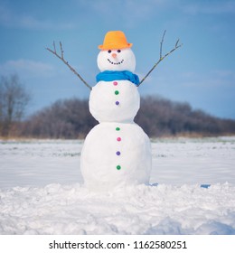 Happy Smiling Snow Man On Sunny Winter Day.