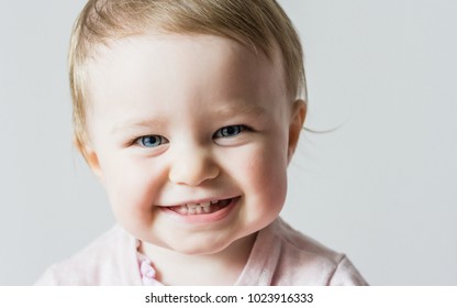 Happy Smiling Toddler Girl Portrait Isolated Closeup Beautiful Child With Blue Eyes Childhood Happy Smiling Toddler Girl Portrait Isolated Closeup Beautiful Child With Blue Eyes Childhood