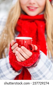 Happy Smiling Winter Woman with Mug Outdoor.