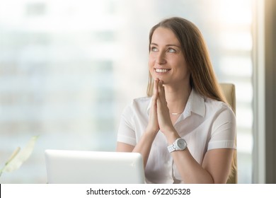 Happy Smiling Woman Looks Up, Puts Hands Together In Prayer, Feels Grateful, Hopes For Successful Plan Realization, Believes In Business Success, Wishes Dream Come True, Visualizes Future, Head Shot