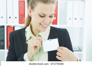 Happy Smiling Young Business Woman Wearing Blank Badge. Name Tag On Chest. Person Identity Label. Business Card Mock-up.