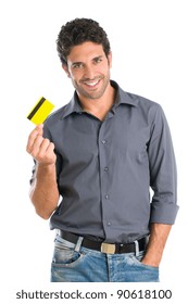 Happy Smiling Young Man Holding A Credit Card Isolated On White Background