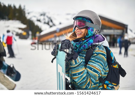 Happy snowboarder on the mountain.Winter sport. 