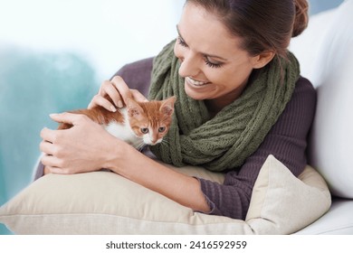 Happy, sofa and woman with kitten in home for bonding, friendship and relax together in house. Animal care, pets and person with adorable, cute and young cat on couch for playing, affection and love - Powered by Shutterstock