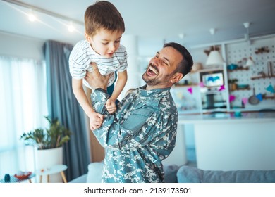 Happy soldier play with his son. Soldier enjoying at home with children. My Hero is back home. Little boy meeting his military father at home. Memorial Day celebration

 - Powered by Shutterstock