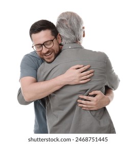 Happy son and his dad hugging on white background - Powered by Shutterstock