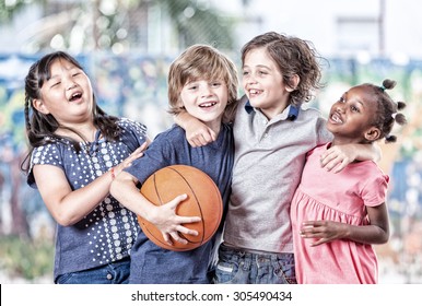 Happy sport school scene. Multi ethnic classroom playing basketball. - Powered by Shutterstock