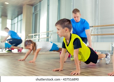 Happy sporty children in gym.