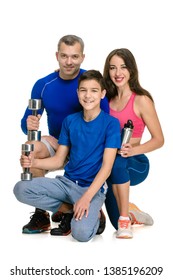 Happy Sporty Family Doing Lifting Exercise On White Background