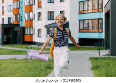 A Happy Student Runs To School, Hurries To Classes, Rejoices In The New Academic Year. Back To School