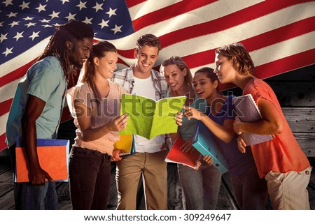 Happy students outside on campus against composite image of digitally generated united states national flag