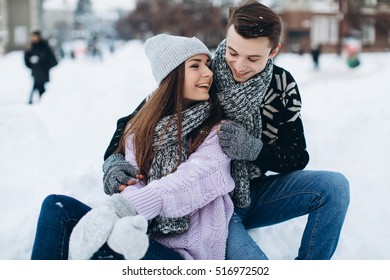 Happy Stylish Couple In Winter City.