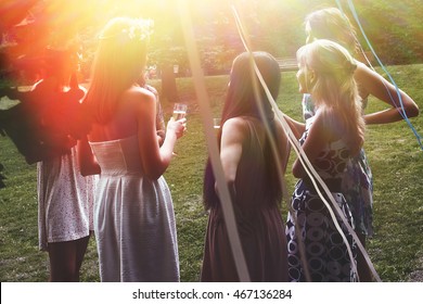 Happy Stylish Woman Toasting Champagne At Joyful Party In Summer Park, Bridal Shower Or Wedding Reception