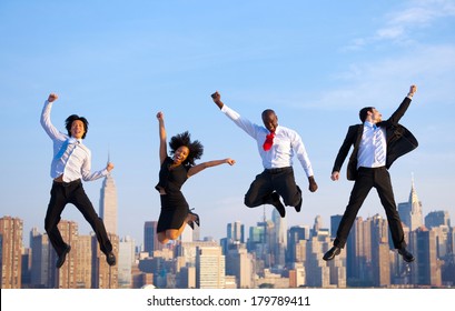 Happy Successful Business People Celebrating and Jumping in New York City - Powered by Shutterstock